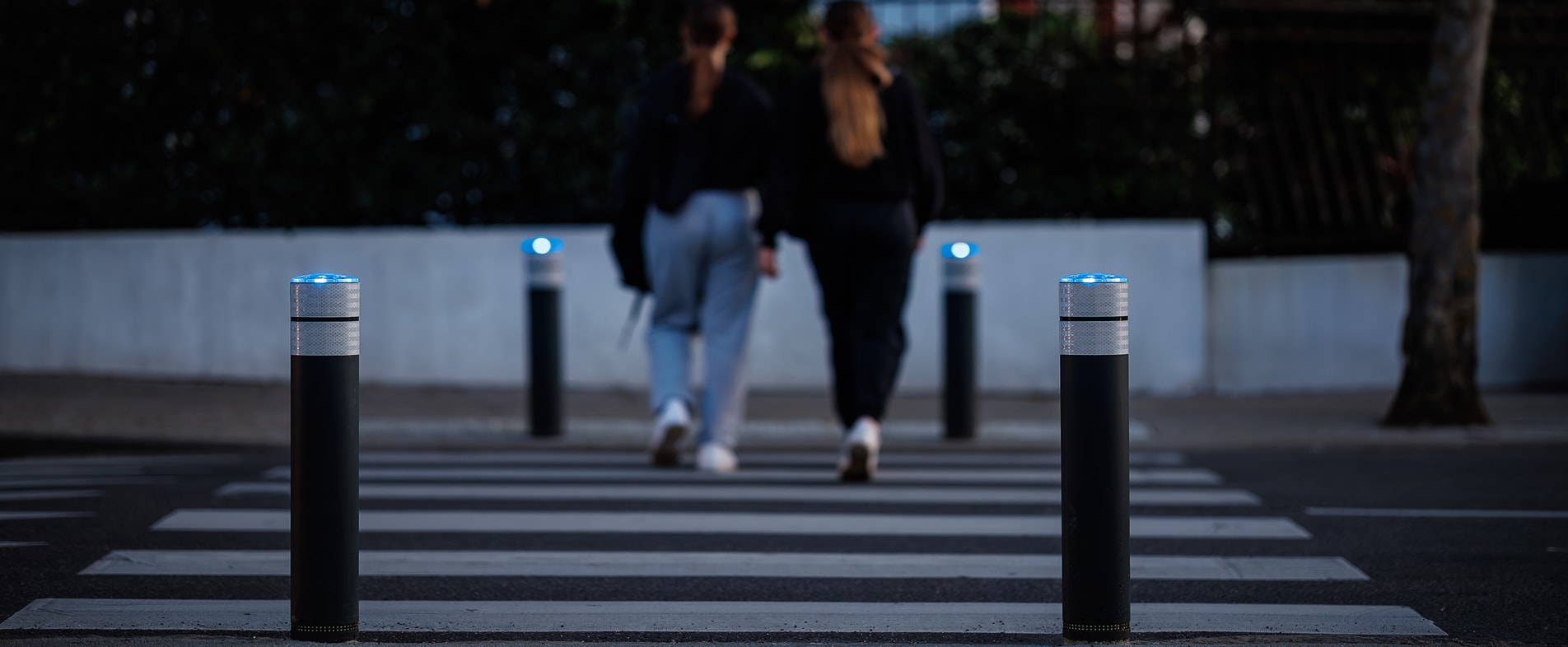 Pedestrian crossing protection with flexible solar bollards